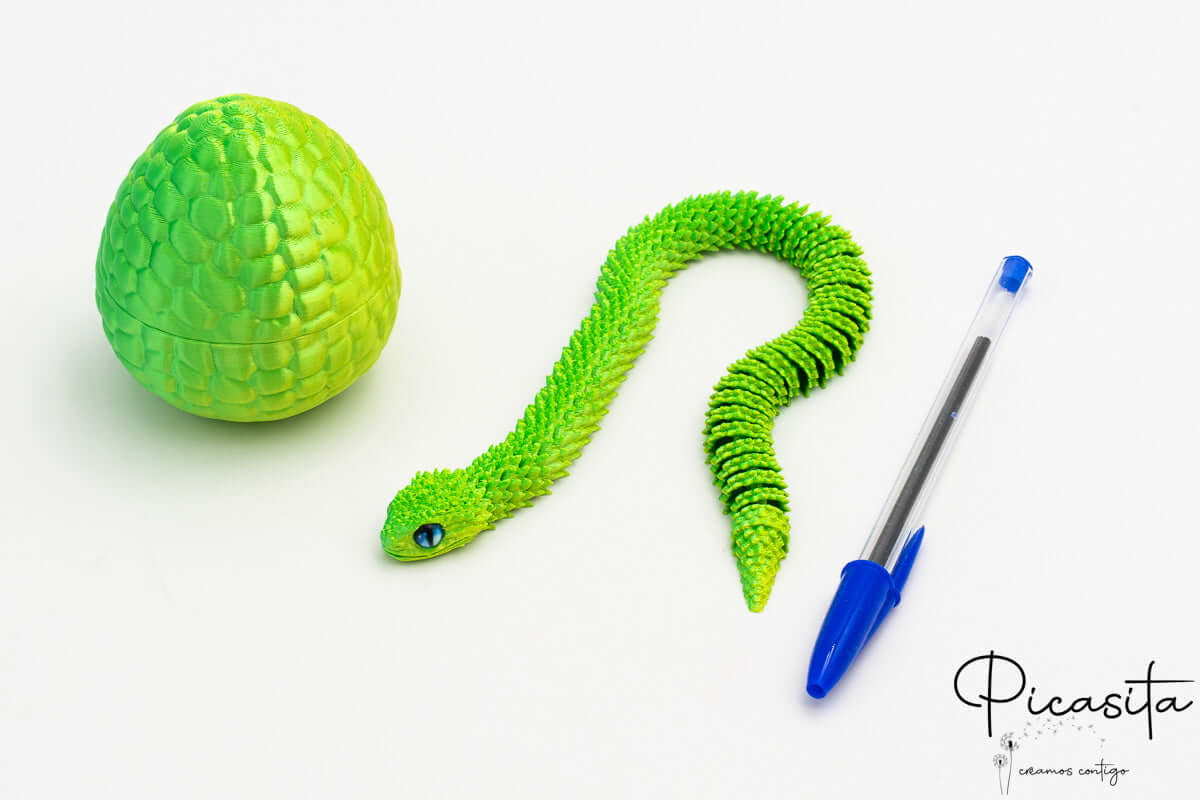 Serpiente 3D articulada con huevo protector de diseño escamado premium