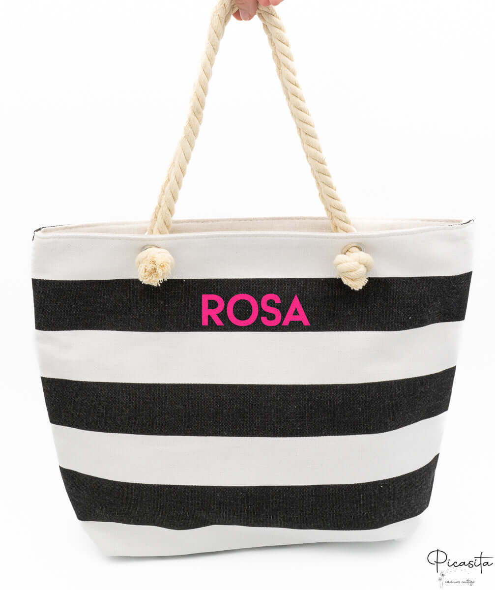 Bolso marinero de lona a rayas blancas y negras con asas de cuerda y nombre personalizado.