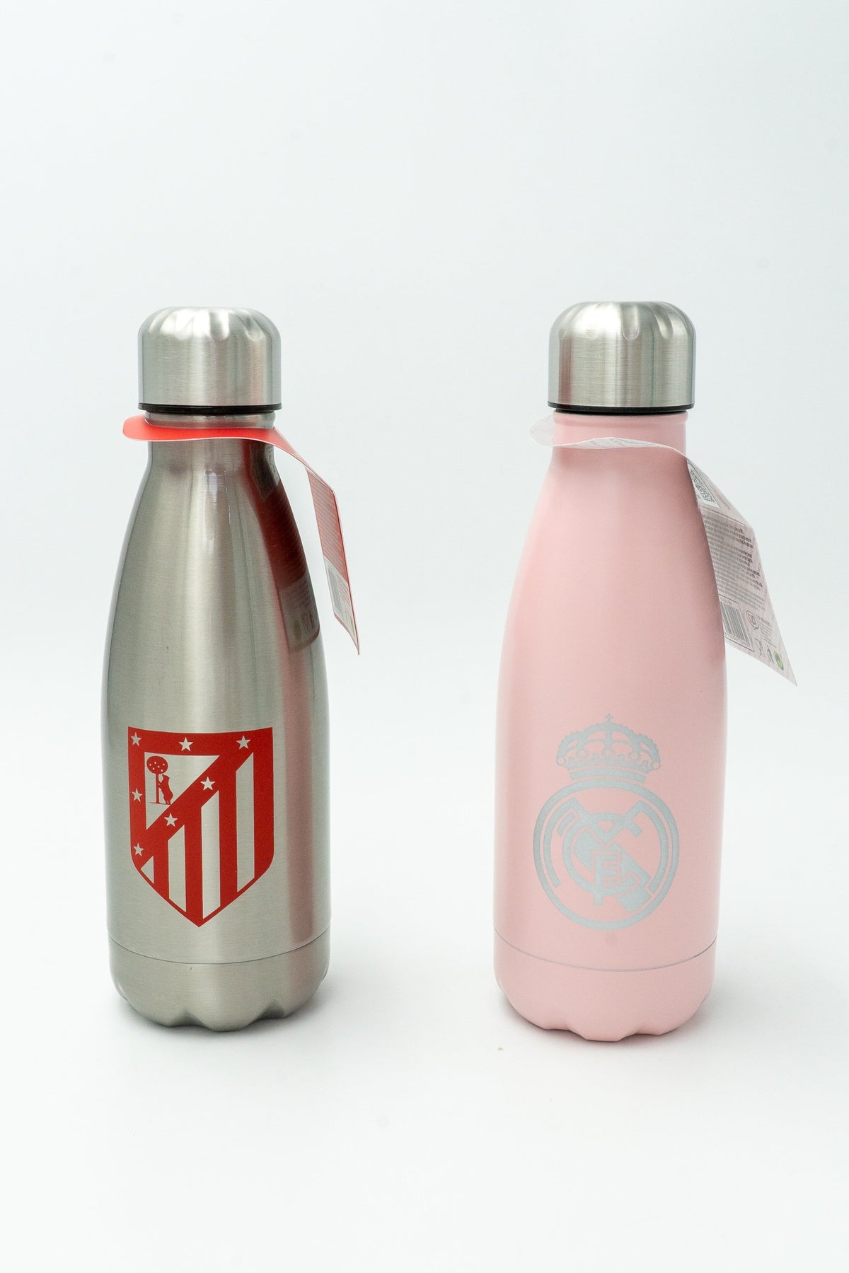 Bottiglie termiche dell'Atlético de Madrid e del Real Madrid con i loro stemmi