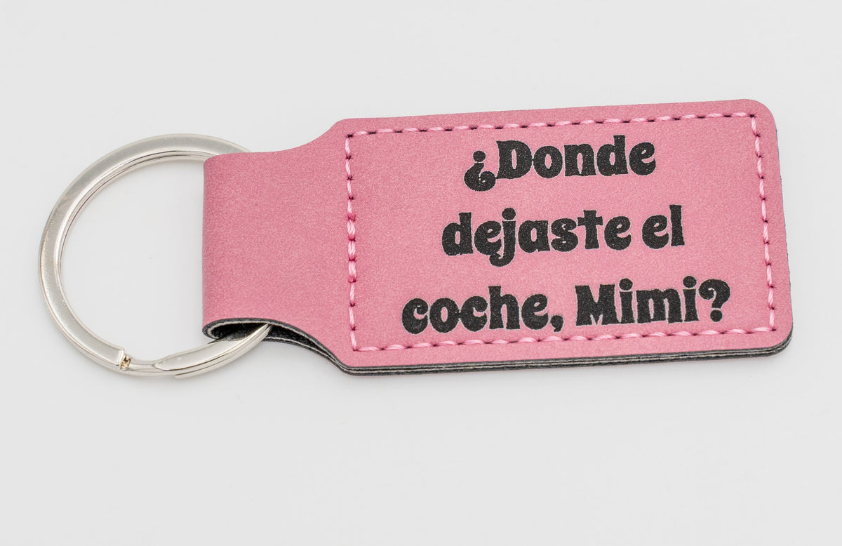 Portachiavi rettangolare rosa con domanda sulle chiavi dell'auto.
